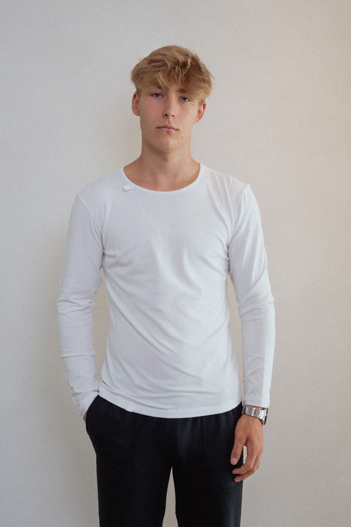 Long-sleeve white without seams or labels for ultimate sensory friendly comfort, perfect for children with sensitive skin or high sensory needs. Pair with SAM's ZEN chewy fidget for reduced stress and improved focus.