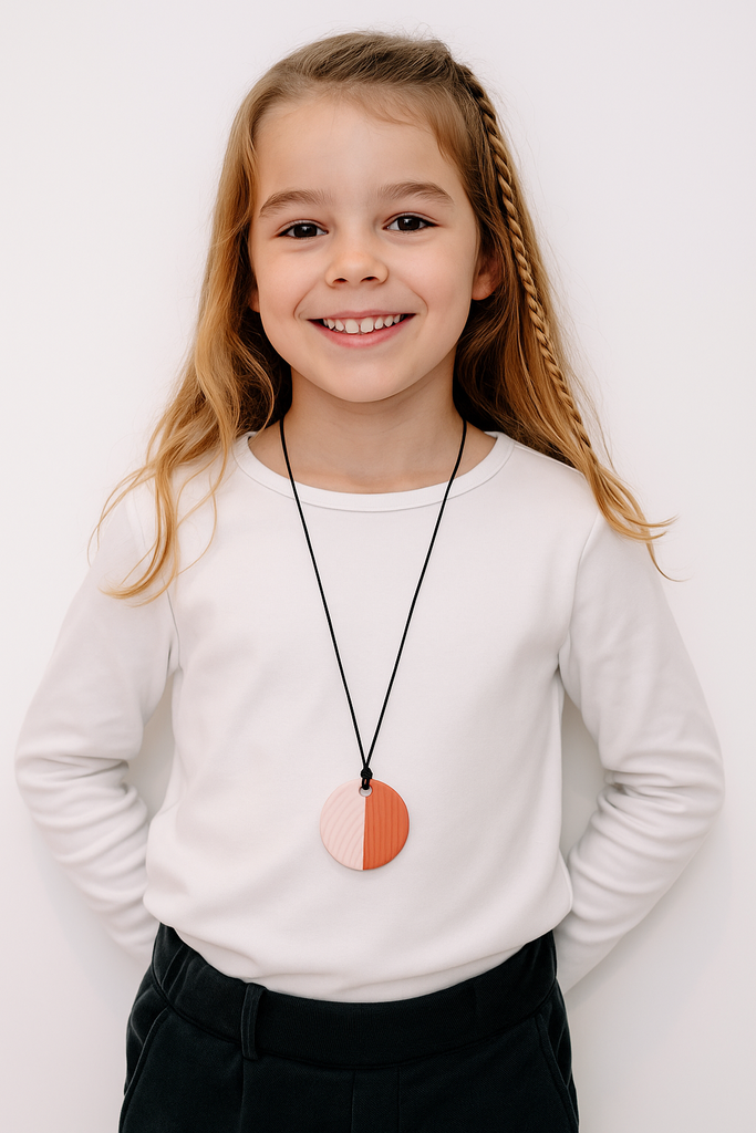 Chew Necklace for boys and girls, subtle and discreet. Food grade safe silicone. Tactile fidget structure for regulation.