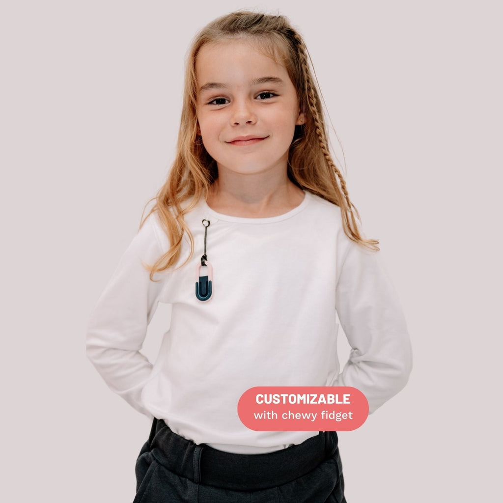 Long-sleeve white without seams or labels for ultimate sensory friendly comfort, perfect for children with sensitive skin or high sensory needs. Pair with SAM's ZEN chewy fidget for reduced stress and improved focus.