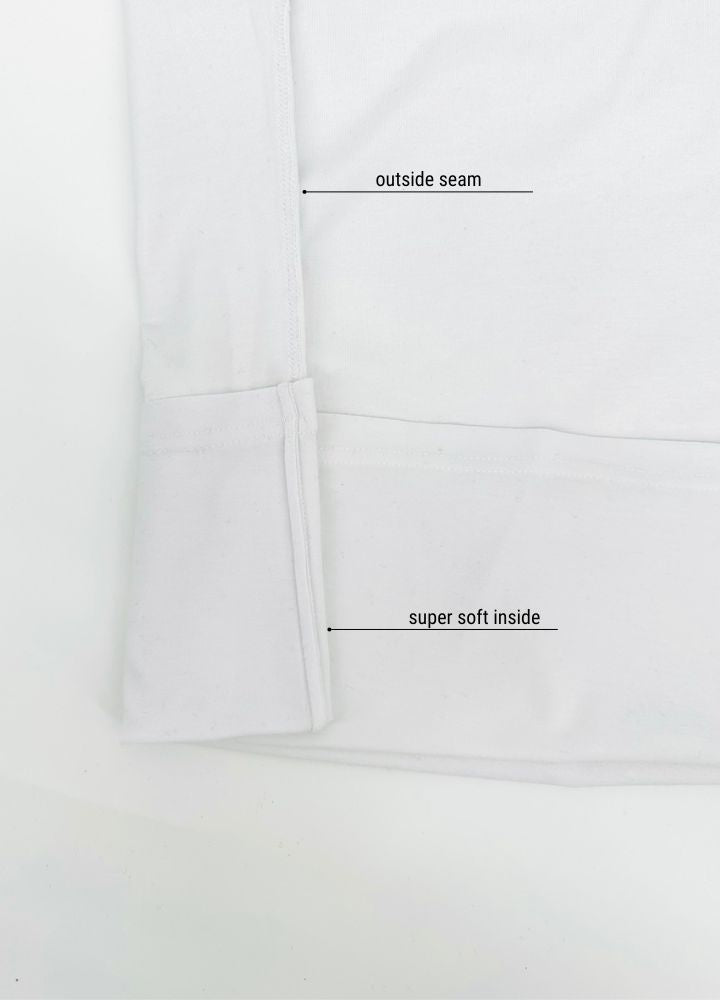 Long-sleeve white without seams or labels for ultimate sensory friendly comfort, perfect for children with sensitive skin or high sensory needs. Pair with SAM's ZEN chewy fidget for reduced stress and improved focus.