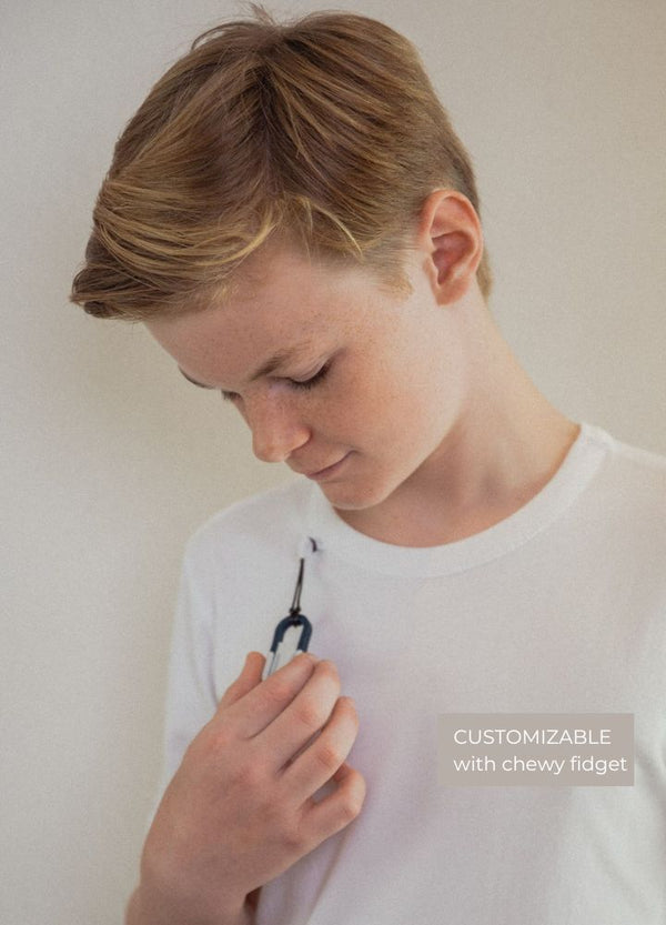 White sensory-friendly T-shirt with a seamless design, perfect for ultimate comfort and reduced irritation for sensory sensitive children and teens of kids with sensitive skin.