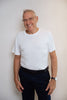 Sensory friendly seamless soft white T-shirt without labels or tags for sensory sensitive adults or people with sensitive skin.