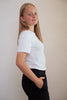 White sensory-friendly T-shirt with a seamless design, perfect for ultimate comfort and reduced irritation for sensory sensitive children and teens of kids with sensitive skin.