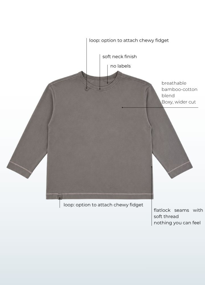 Breathable bamboo cotton fabric detail and hem fidget loop on the boxy kids longsleeve